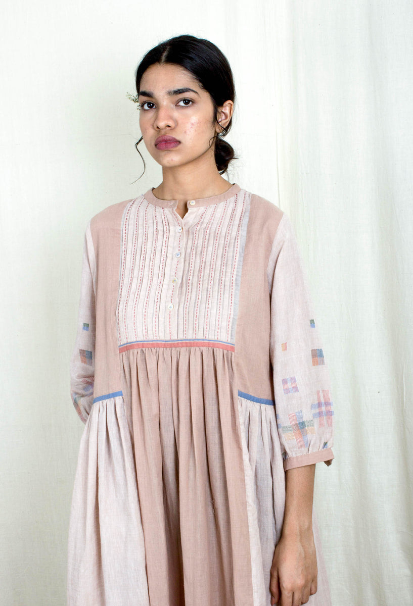 Terracotta Muslin Jamdani Dress with Pin-Tuck Detailing and Adjustable Side Ties main image 1