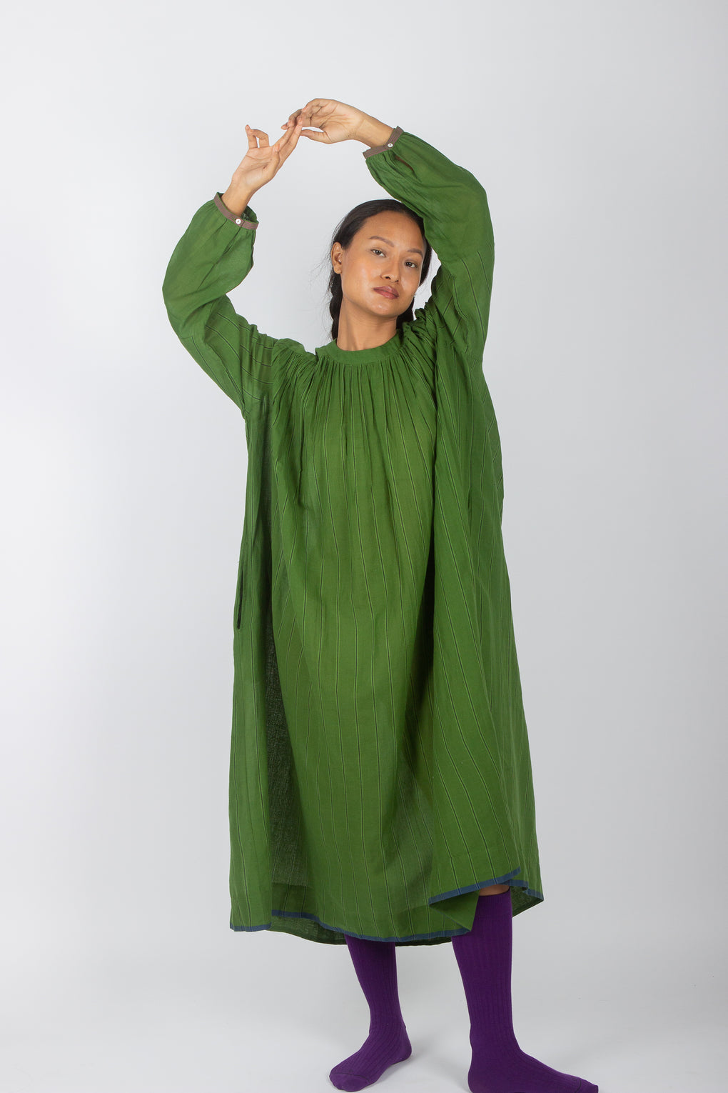 Handmade sustainable women's wear green dress by Karnam