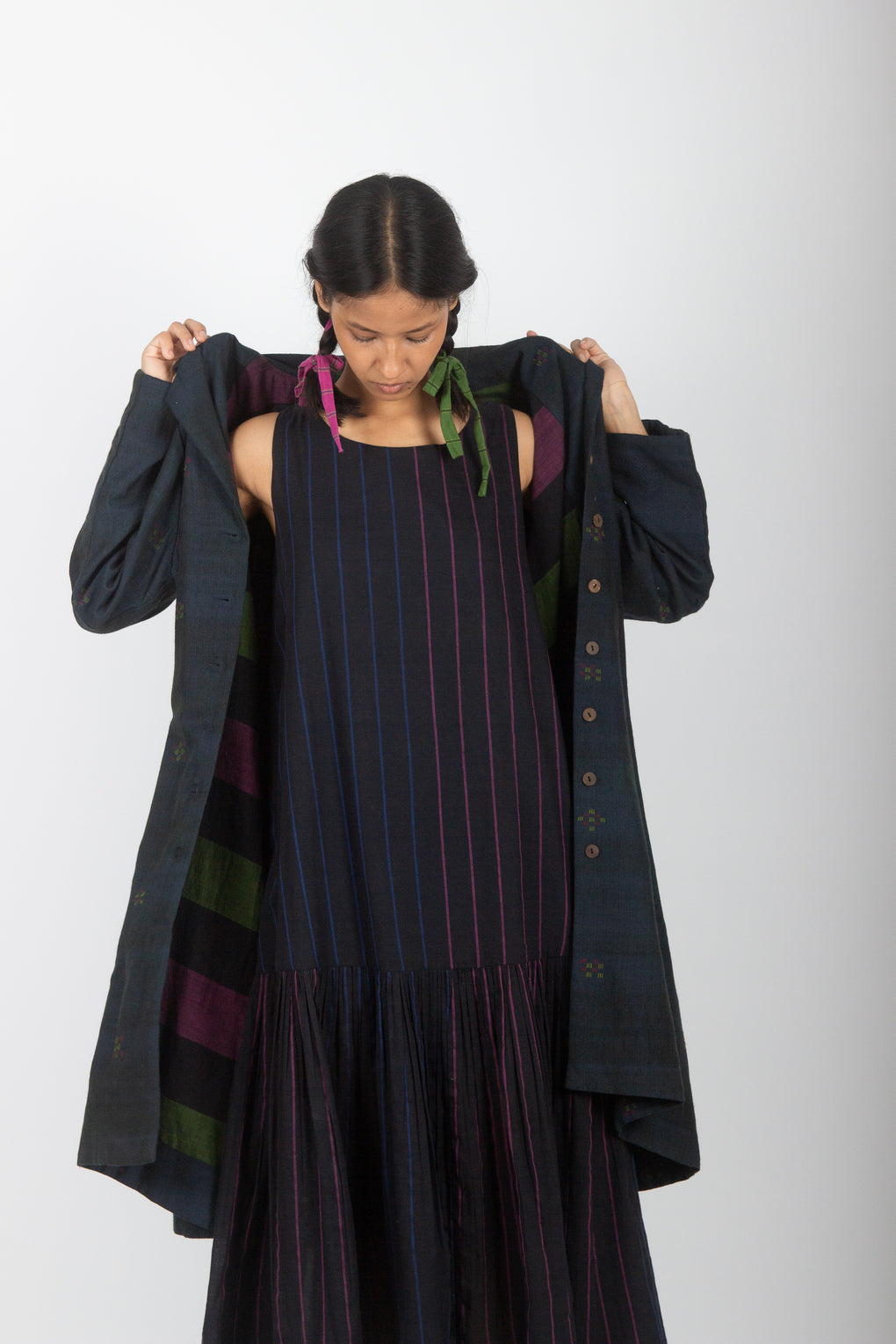 Aruea: Sleeveless Tiered Handwoven Muslin Dress.