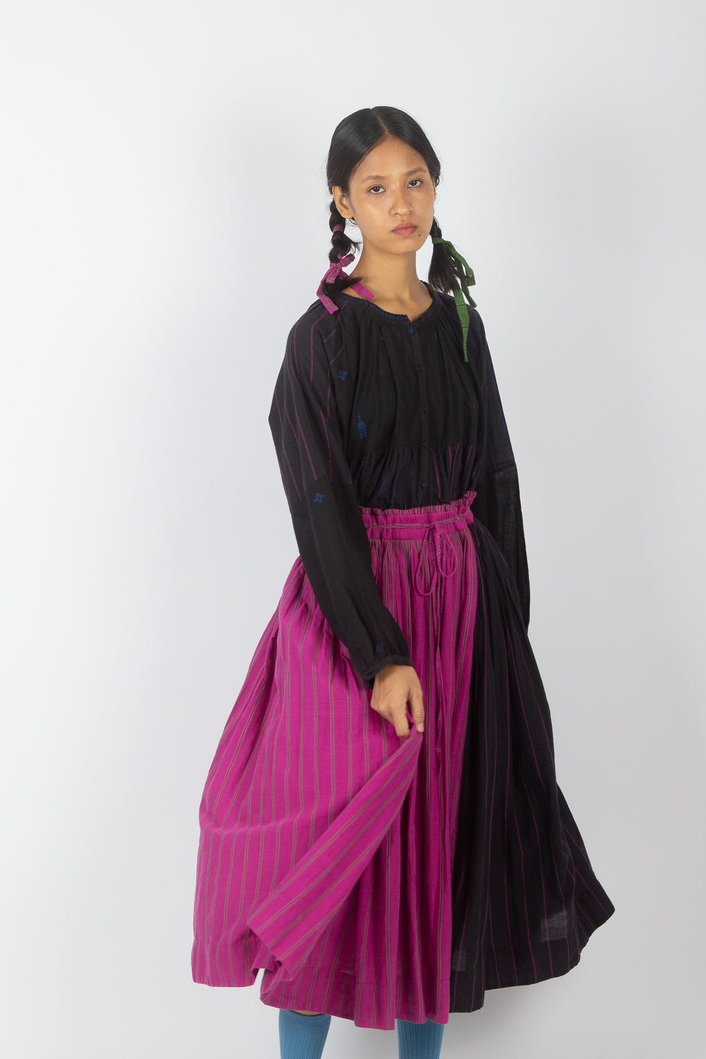 Model wearing a black cotton jamdani top from Karnam