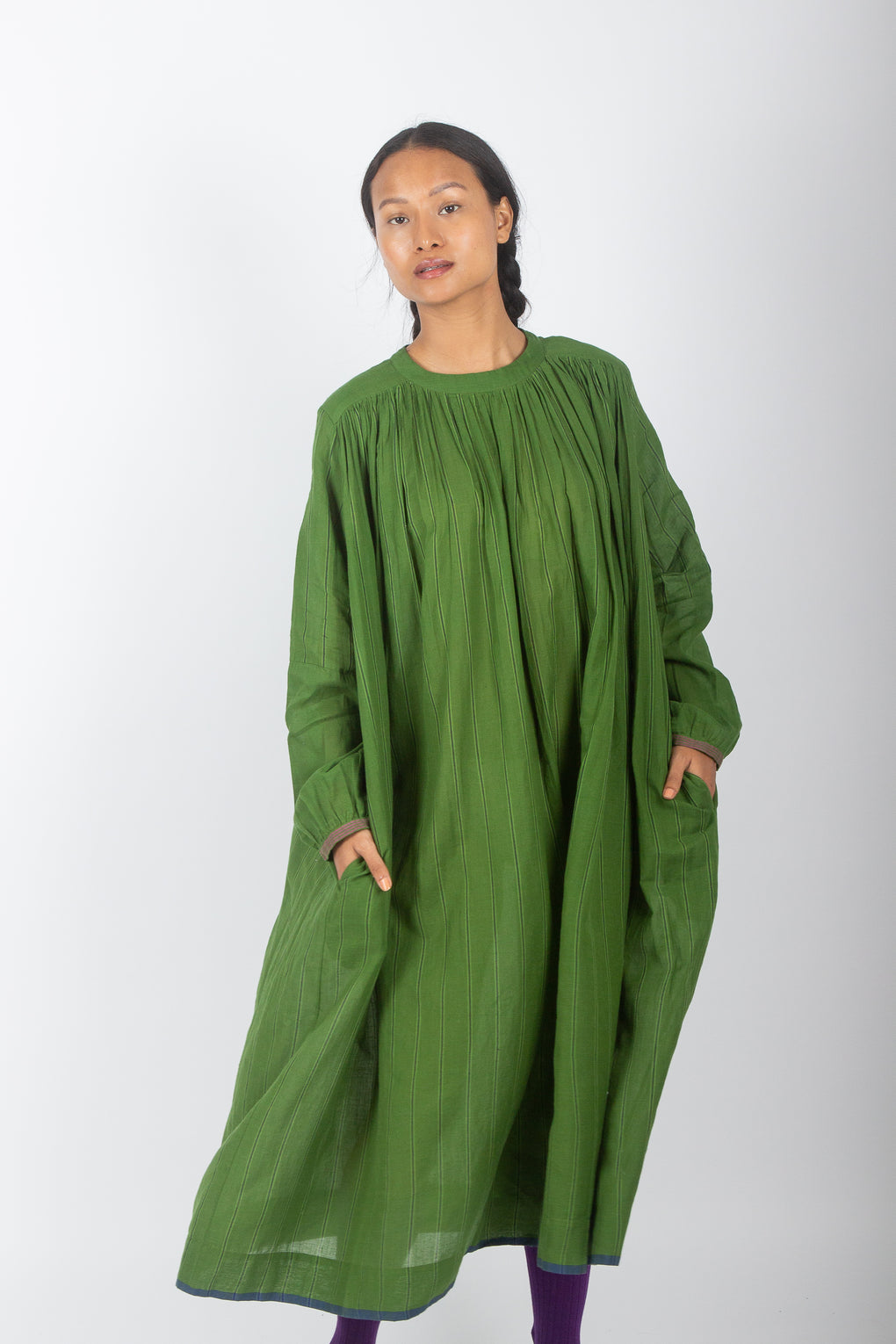 closeup ethically made green dress by Karnam
